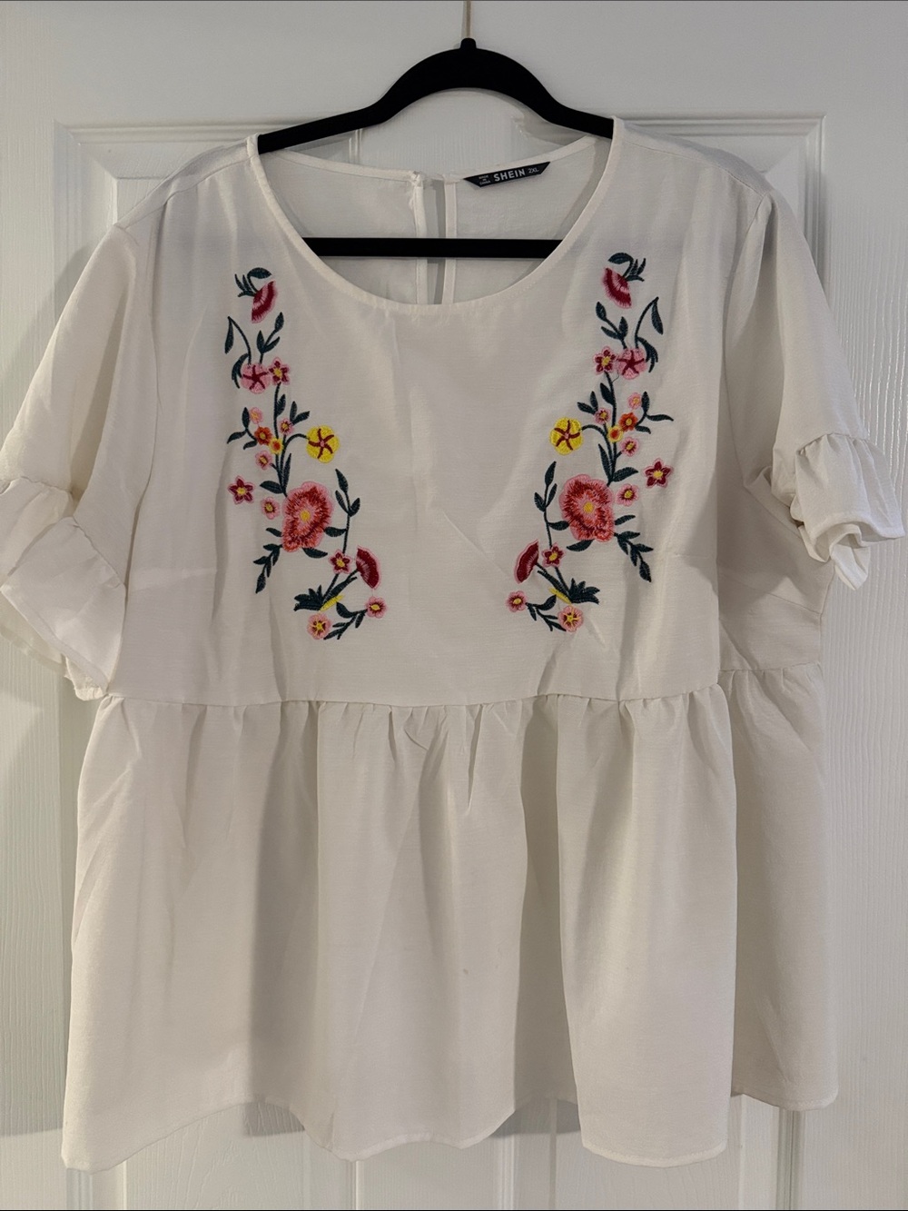SHEIN White Floral Embroidered Ruffle Peplum Blouse